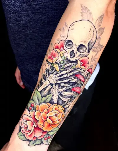 Floral skull in nature tattoo by Ruby Gore, Nature tattoo artist Portland