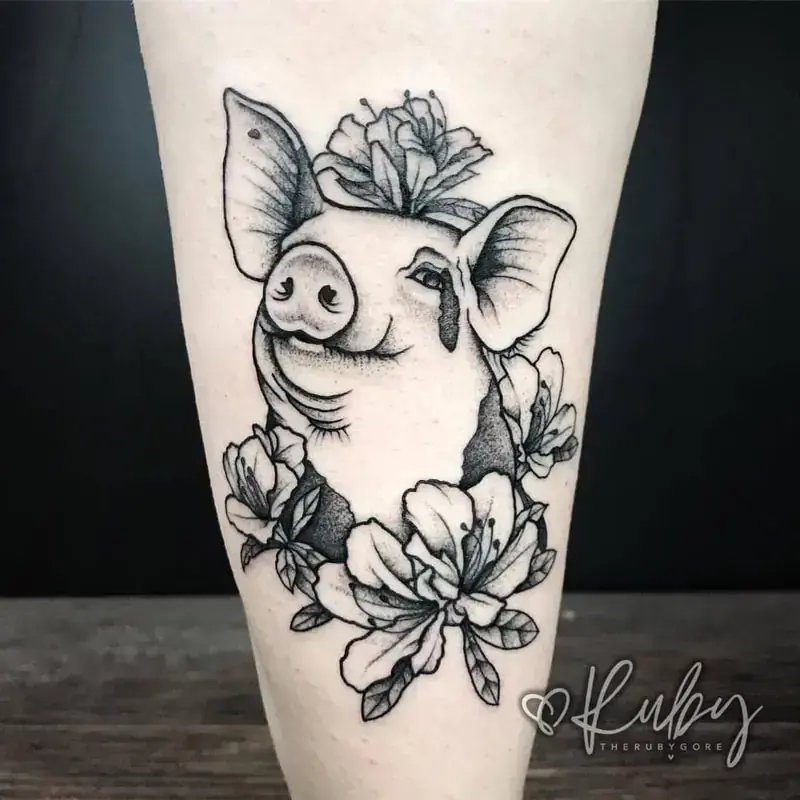 Cute floral pig calf tattoo by vegan tattoo artist Portland Ruby Gore